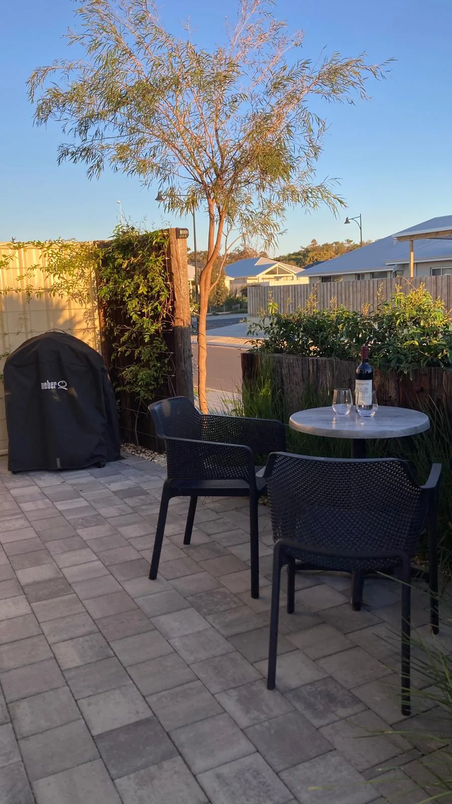Courtyard dining area beside the Weber barbecue