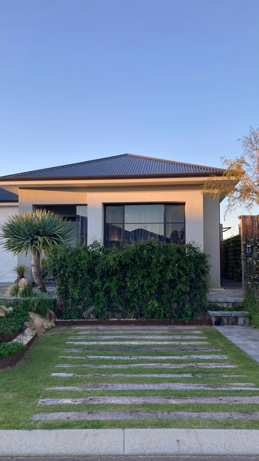 Exterior view of BRiX behind the landscaped front garden