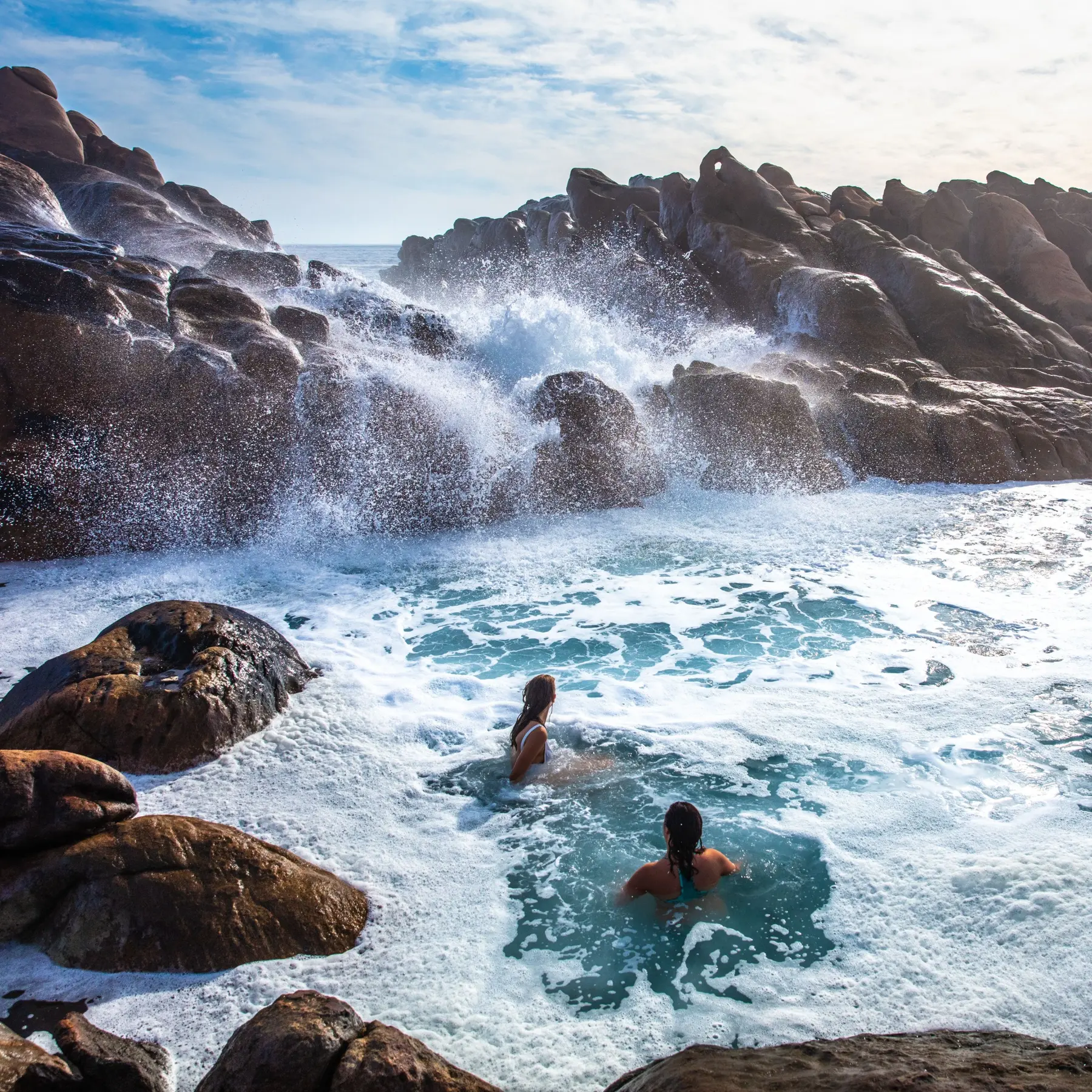 People swimming at Injidup Natural Spa near Yallingup